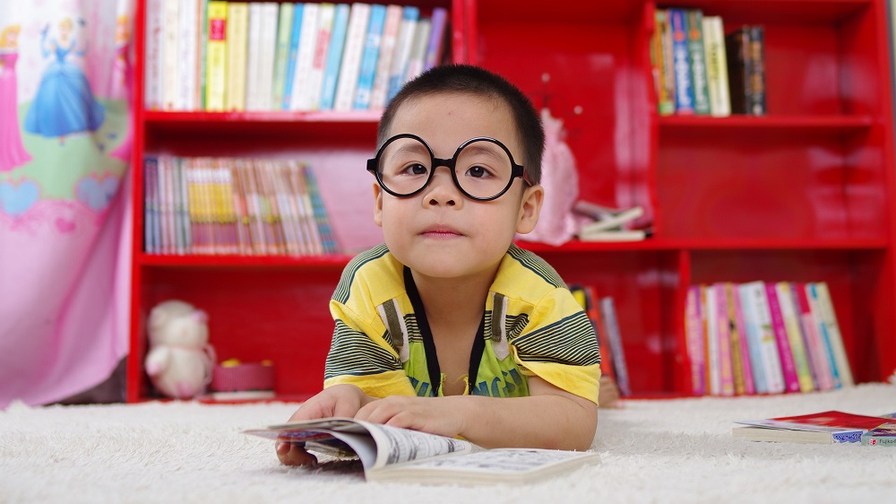 Little Chinese boy with glasses