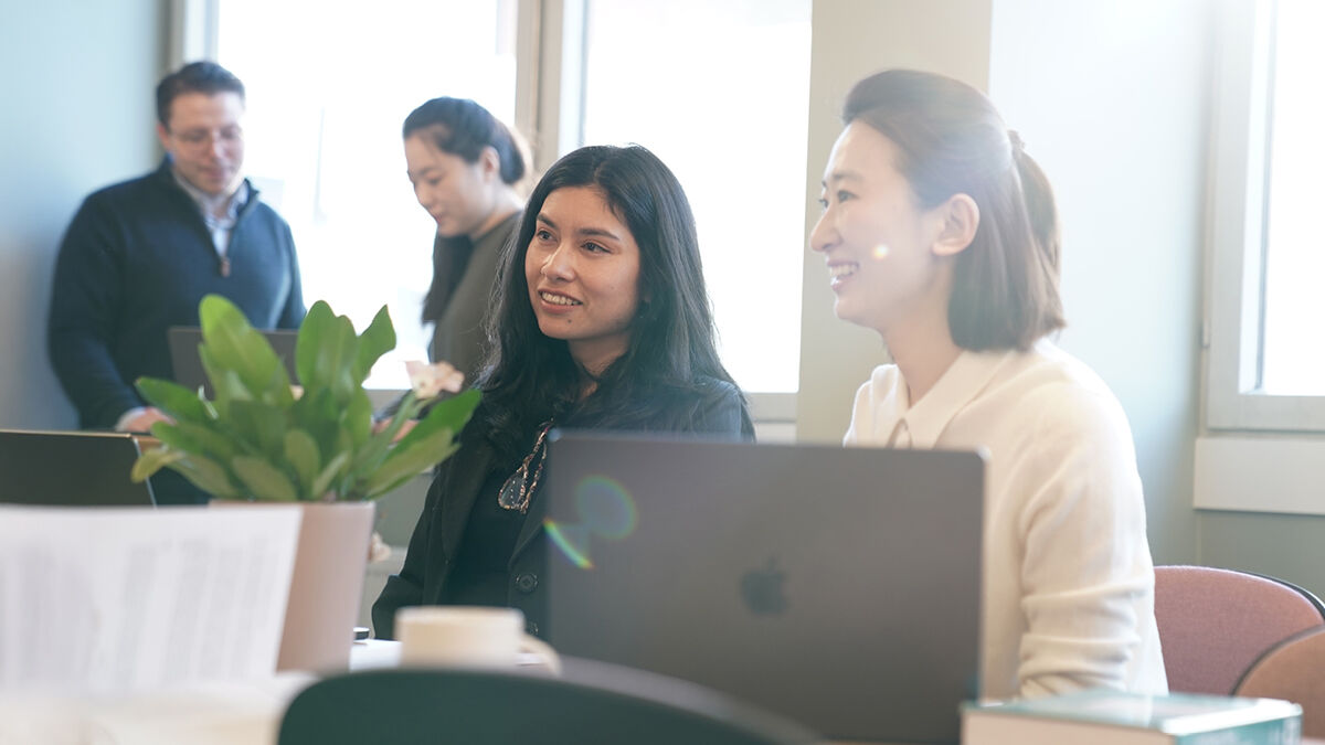 Four researchers at CREATE in the office area