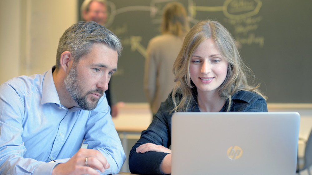 Students with laptop. Illustration photo.