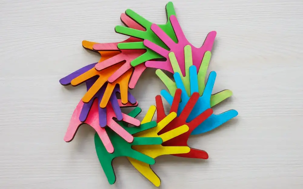 Photo of many hands in different colors