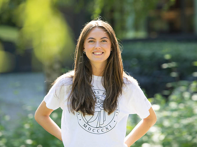 Student on green background